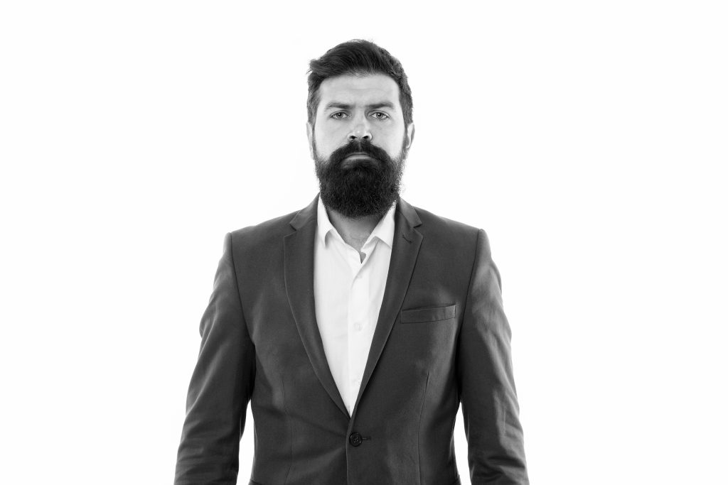 ceo. Bearded man ceo with serious face. Mature hipster with beard. Male in business office. Businessman in formal suit. serious man ceo. Confident brutal man. Business ceo . Modern businessman.